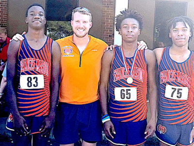Pictured above, FMS Cross Country team members and Coach John Bolding at the school’s first-ever home cross-country meet, hosted in Marion on Saturday, Sept. 13.