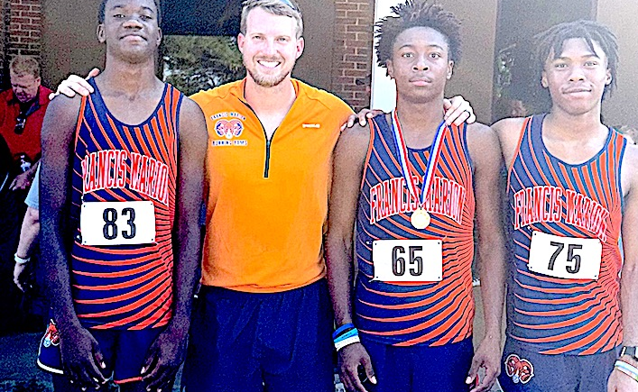 Pictured above, FMS Cross Country team members and Coach John Bolding at the school’s first-ever home cross-country meet, hosted in Marion on Saturday, Sept. 13.